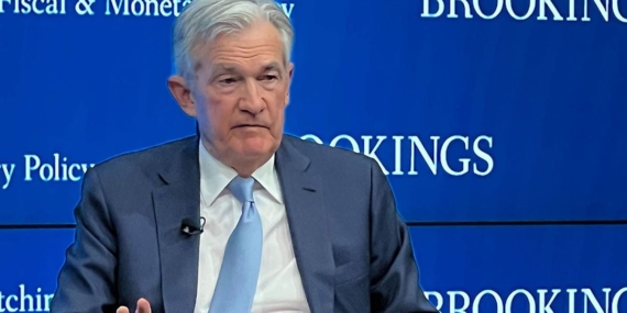 Federal Reserve Holds Policy Steady, but Indicates More Dovish 2024